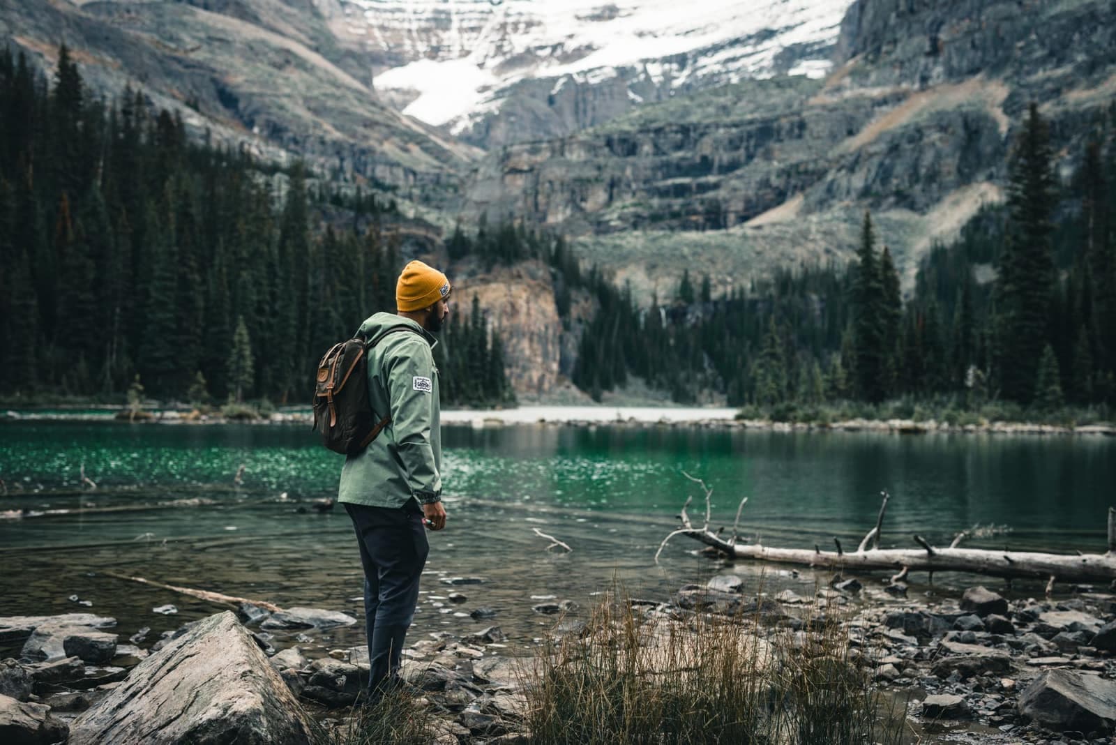 Hiker by a mountain lake